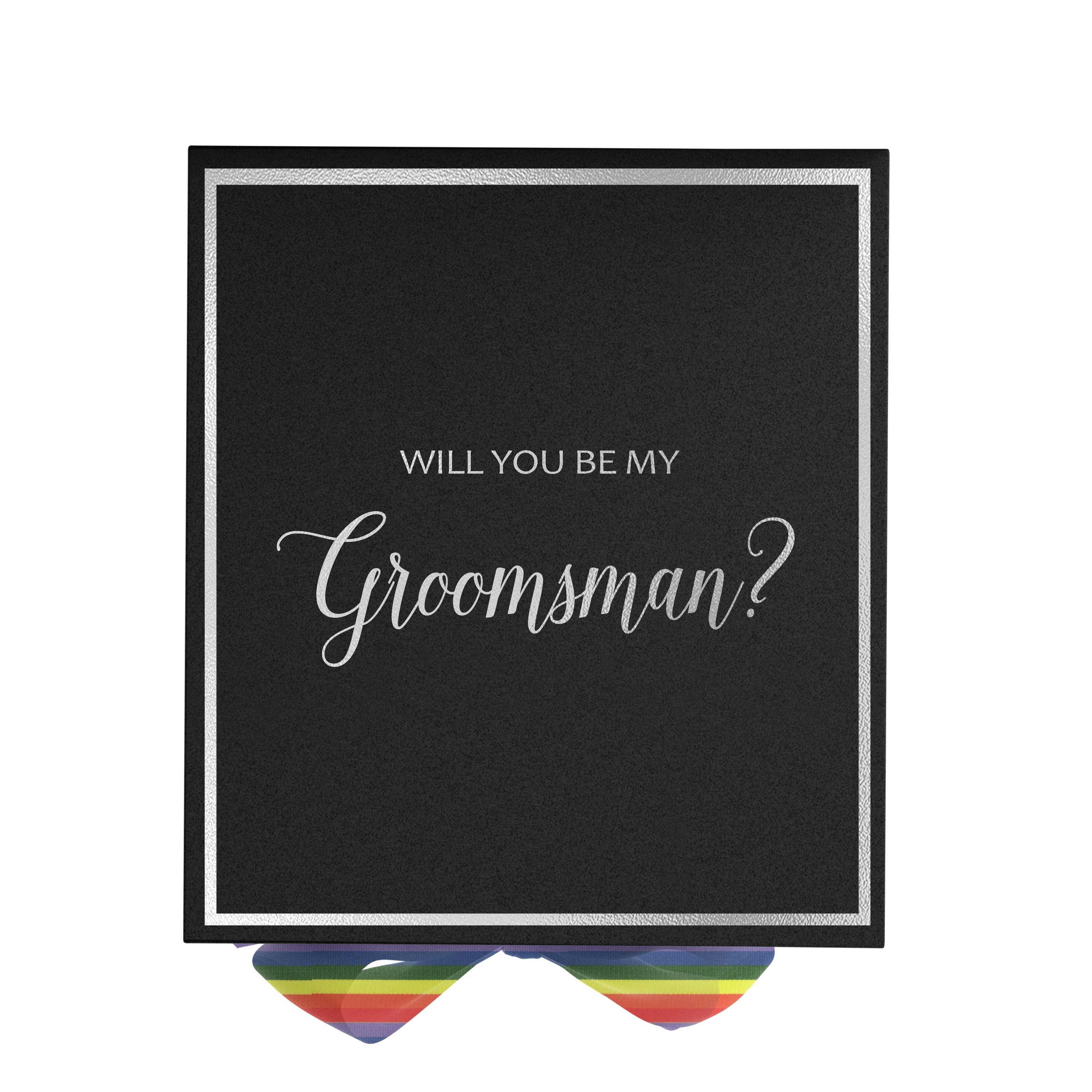 Elegant black groomsman proposal box with rainbow bow and metallic writing on the lid, showcasing its luxurious design.