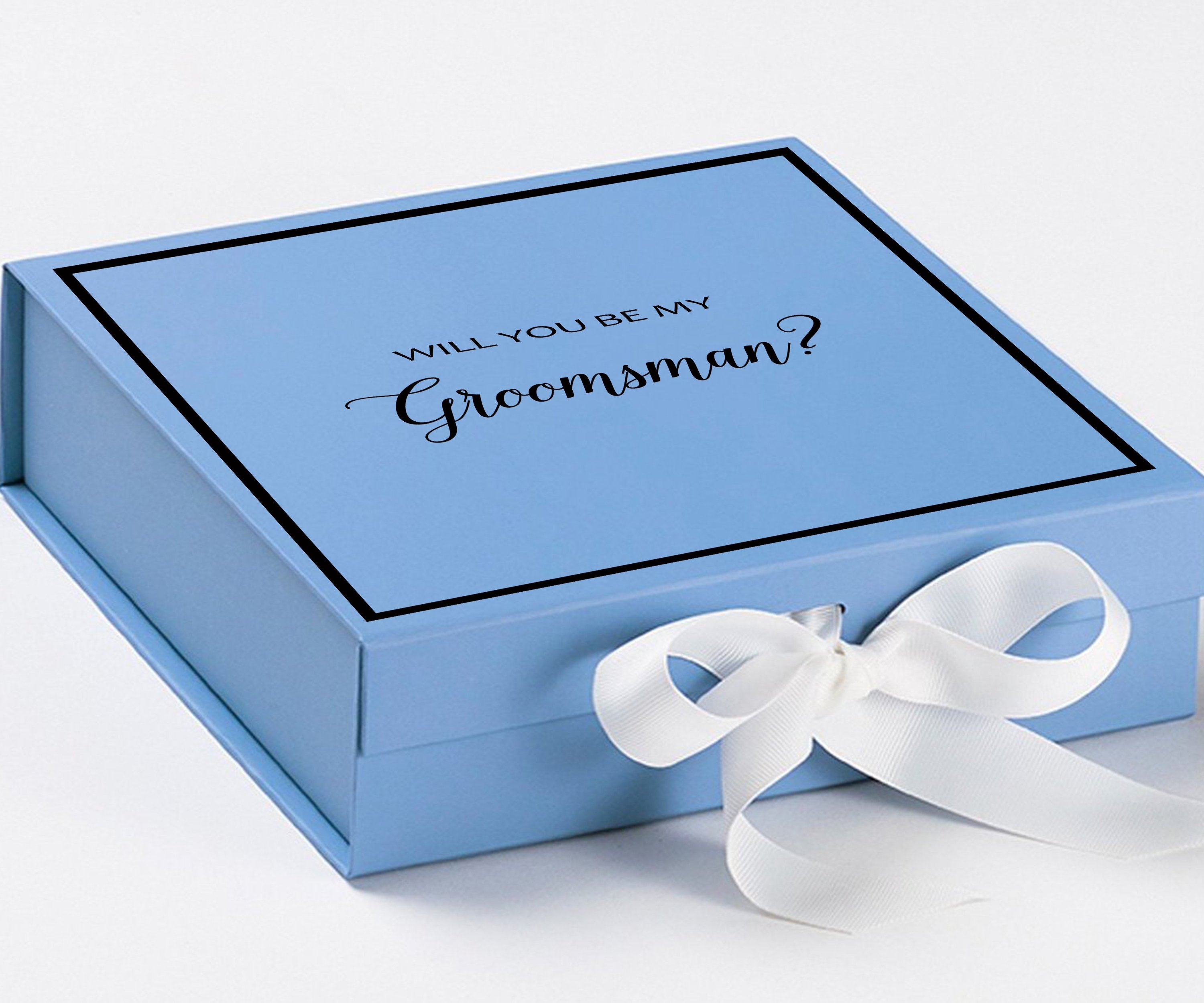 Light blue groomsman proposal box with white bow and metallic writing on the lid, showcasing its elegant design.
