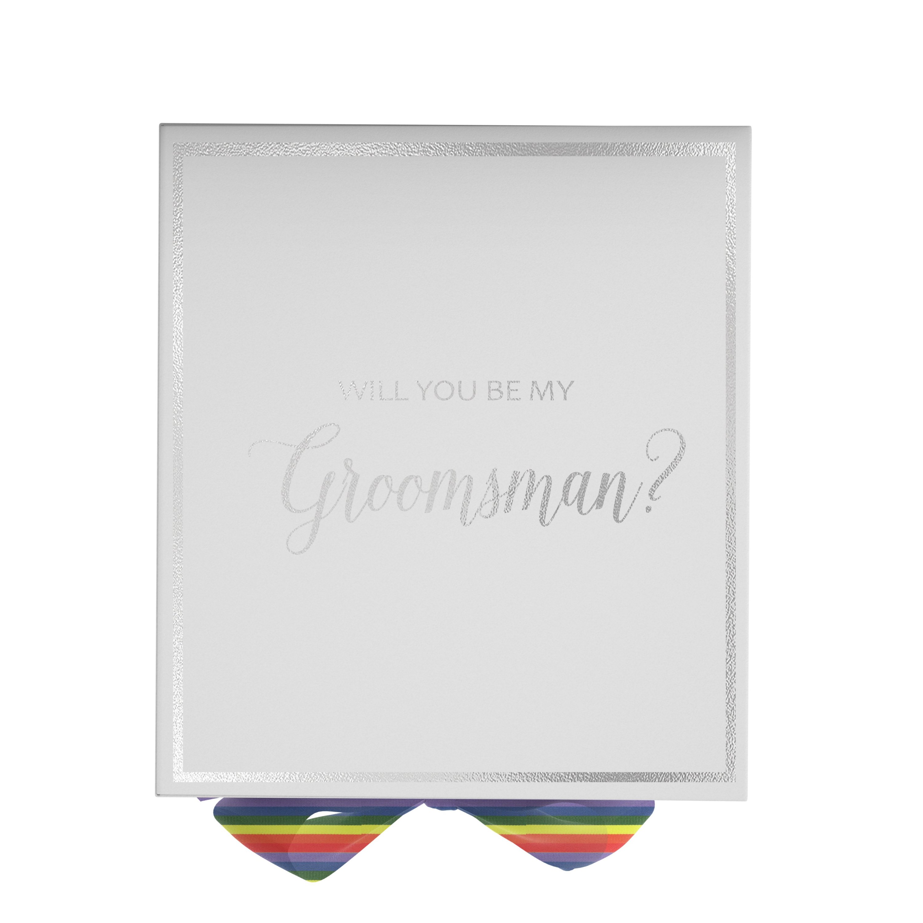 Elegant white groomsman proposal box with metallic writing and rainbow bow, showcasing its luxurious design.