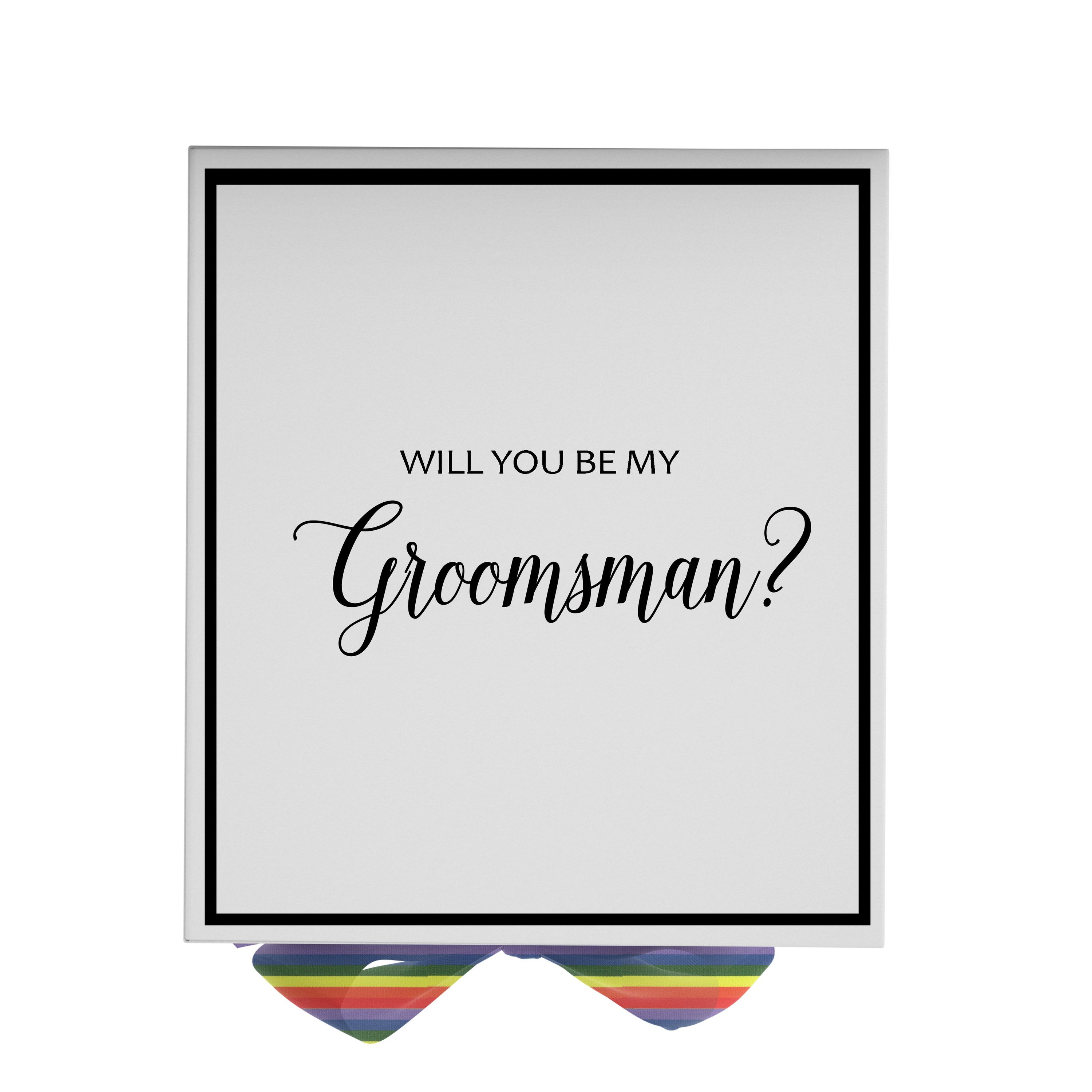 Elegant white groomsman proposal box with metallic writing and rainbow bow, showcasing its luxurious design.