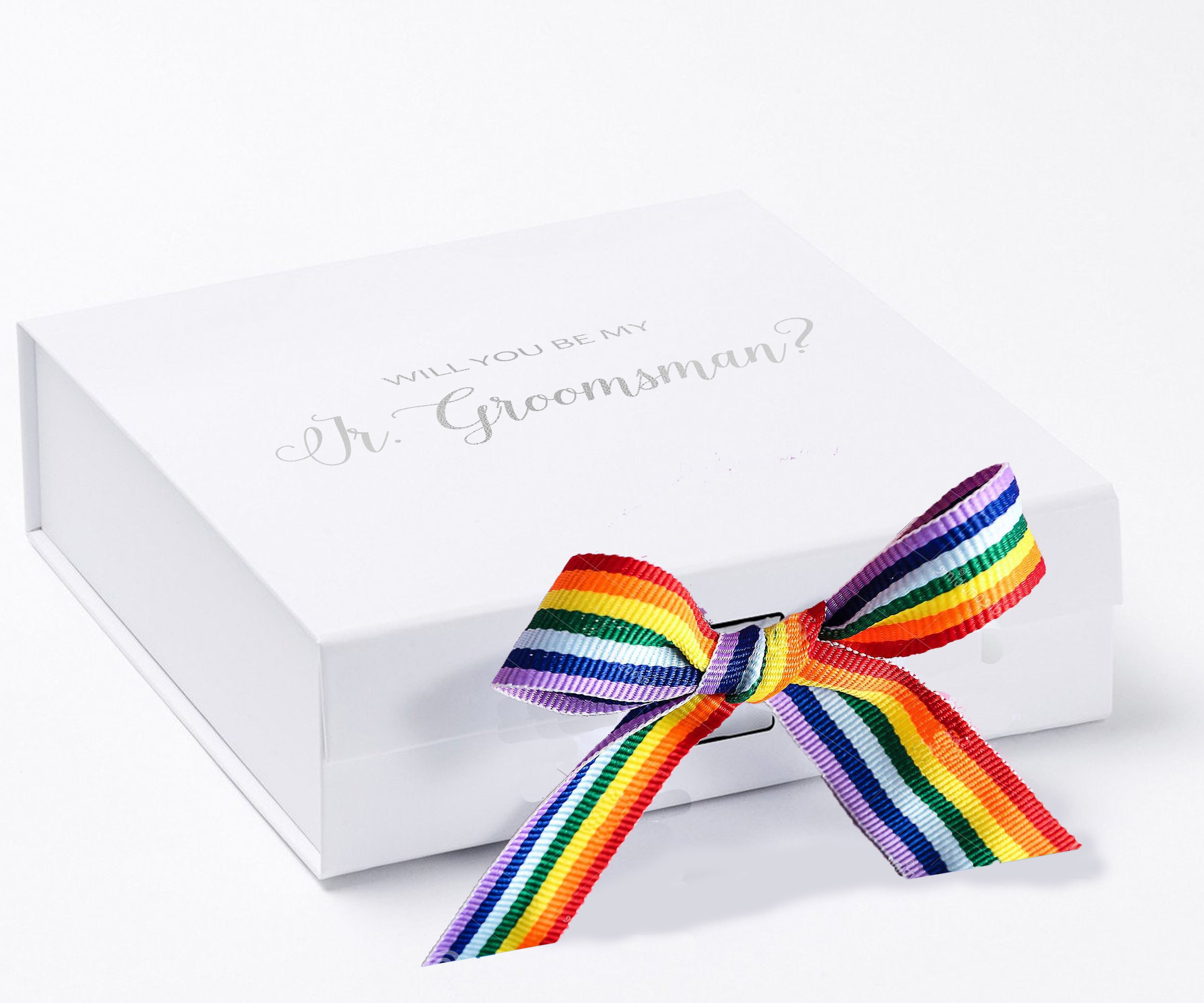 Elegant white proposal box with metallic writing and rainbow bow, designed for junior groomsman proposal.