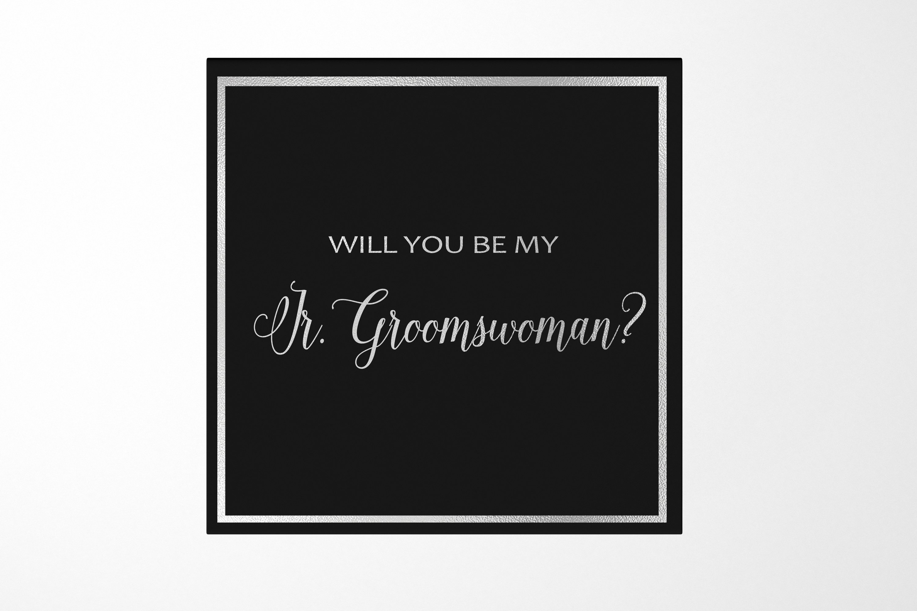 Elegant black proposal box with metallic writing asking 'Will You Be My Jr Groomswoman?' showcasing a luxurious design.