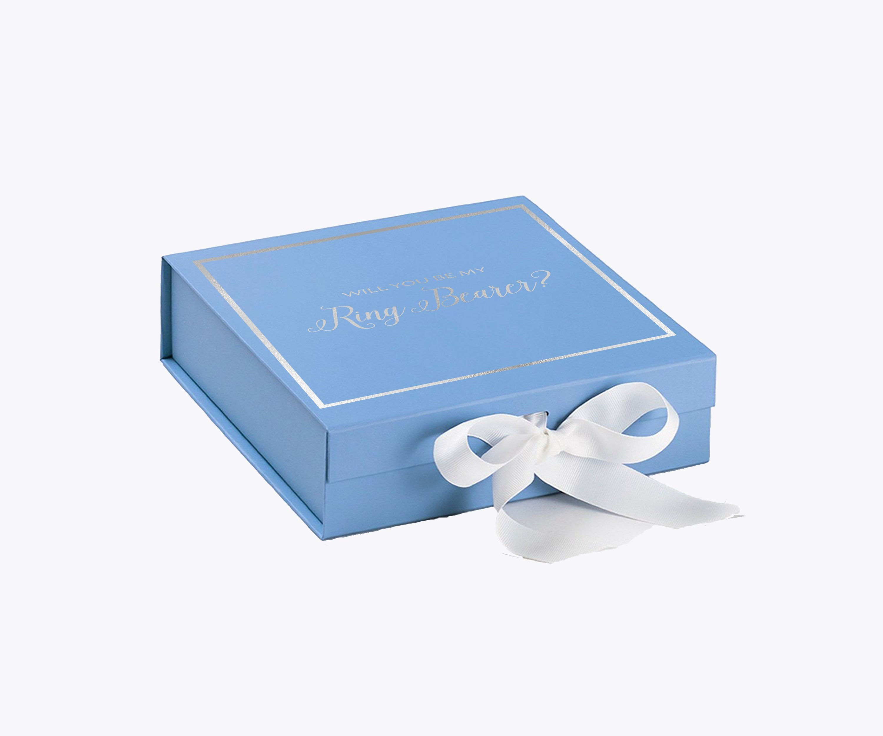 Light blue proposal box with white bow and metallic writing, perfect for ring bearer proposals.