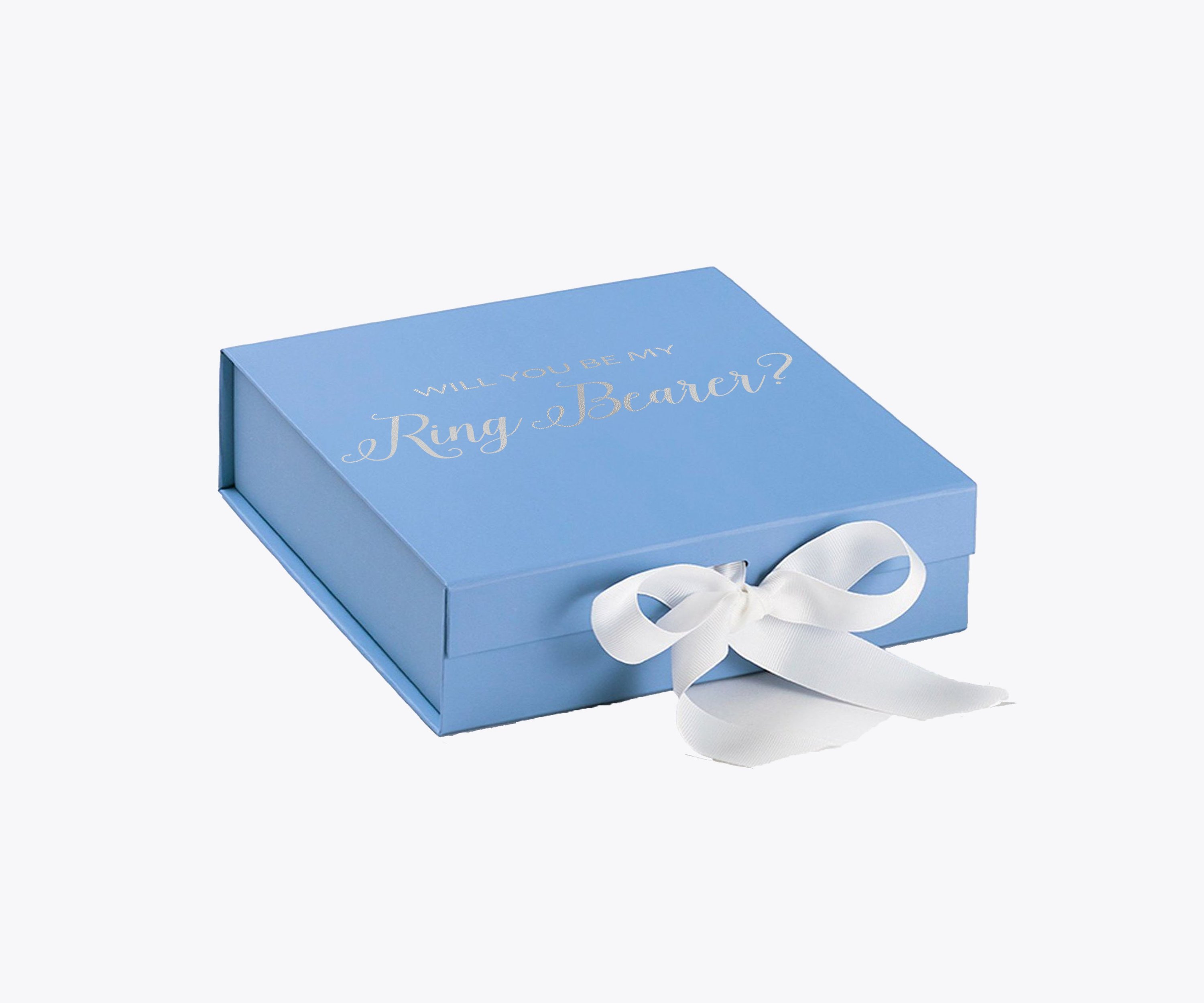 Light blue proposal box with white bow and metallic writing, perfect for ring bearer proposals.