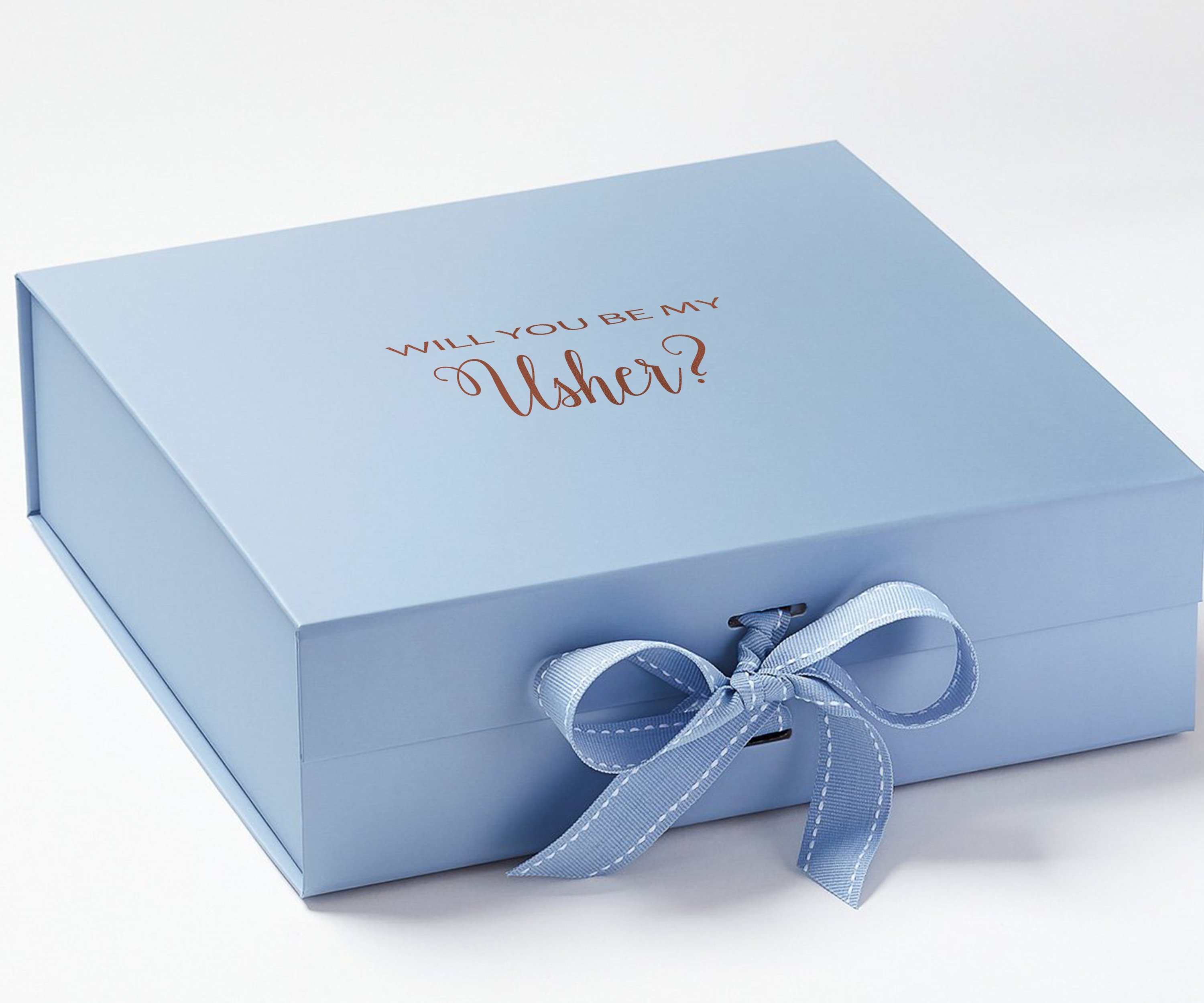 Light blue proposal box with metallic writing and matching bow, showcasing its elegant design.