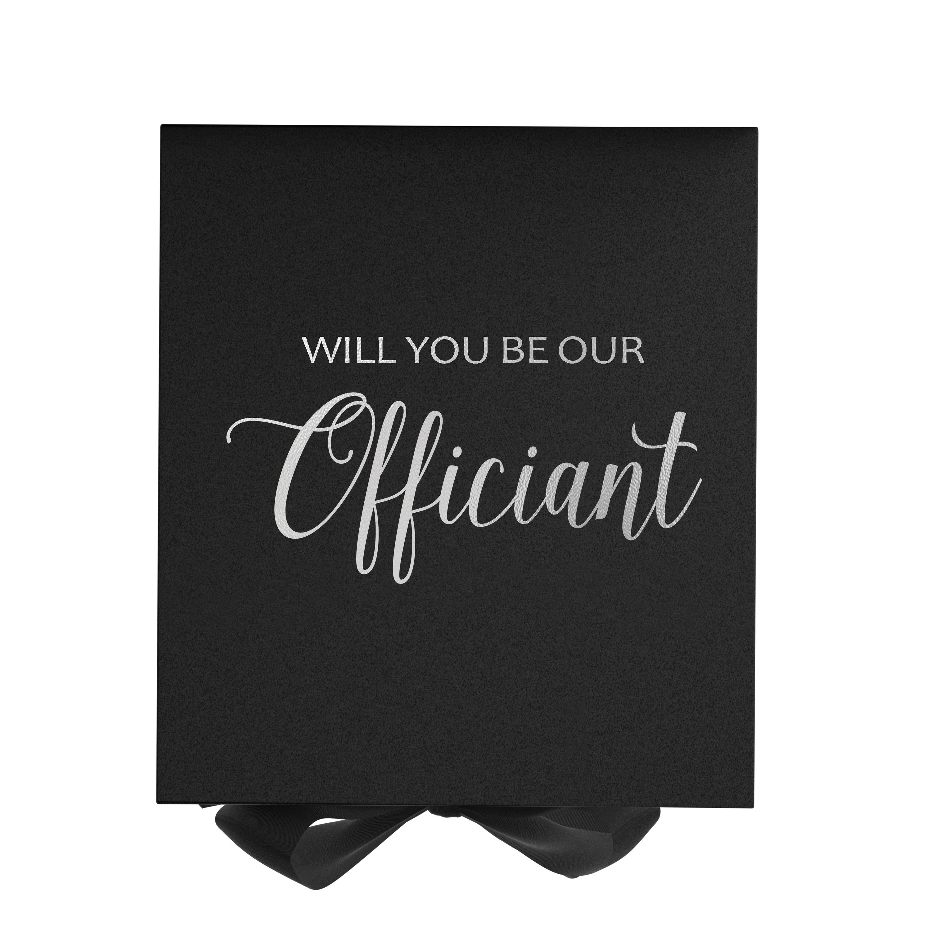 Elegant black proposal box with metallic writing and a black bow, showcasing a luxurious design for officiant proposals.