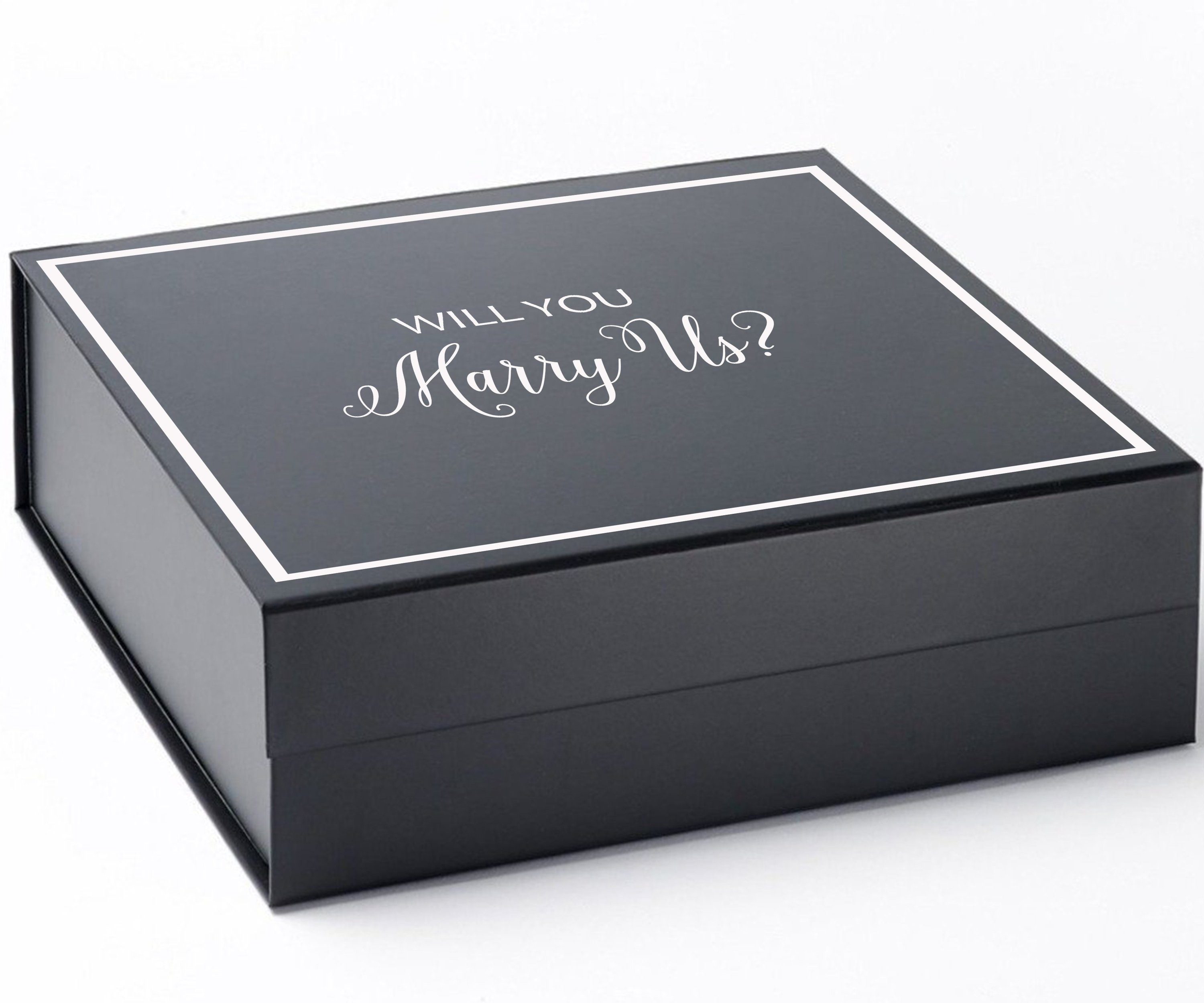 Elegant black proposal box with metallic writing on the lid, showcasing a sleek design without ribbon.