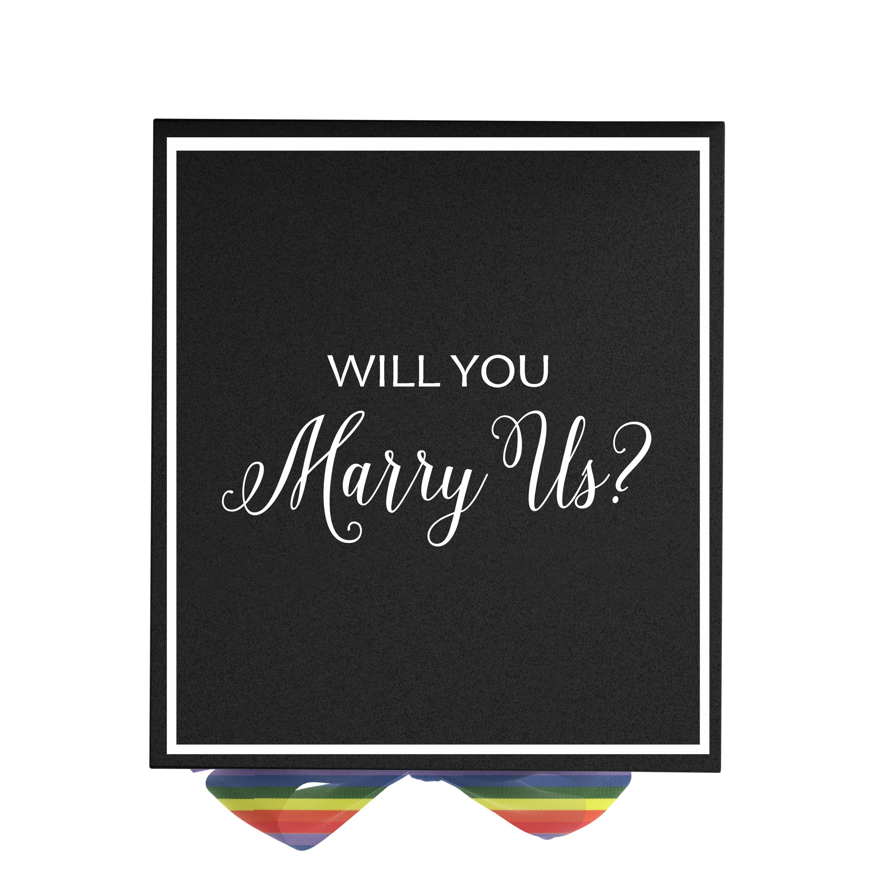 Elegant black proposal box with metallic writing and rainbow ribbon, perfect for engagements.