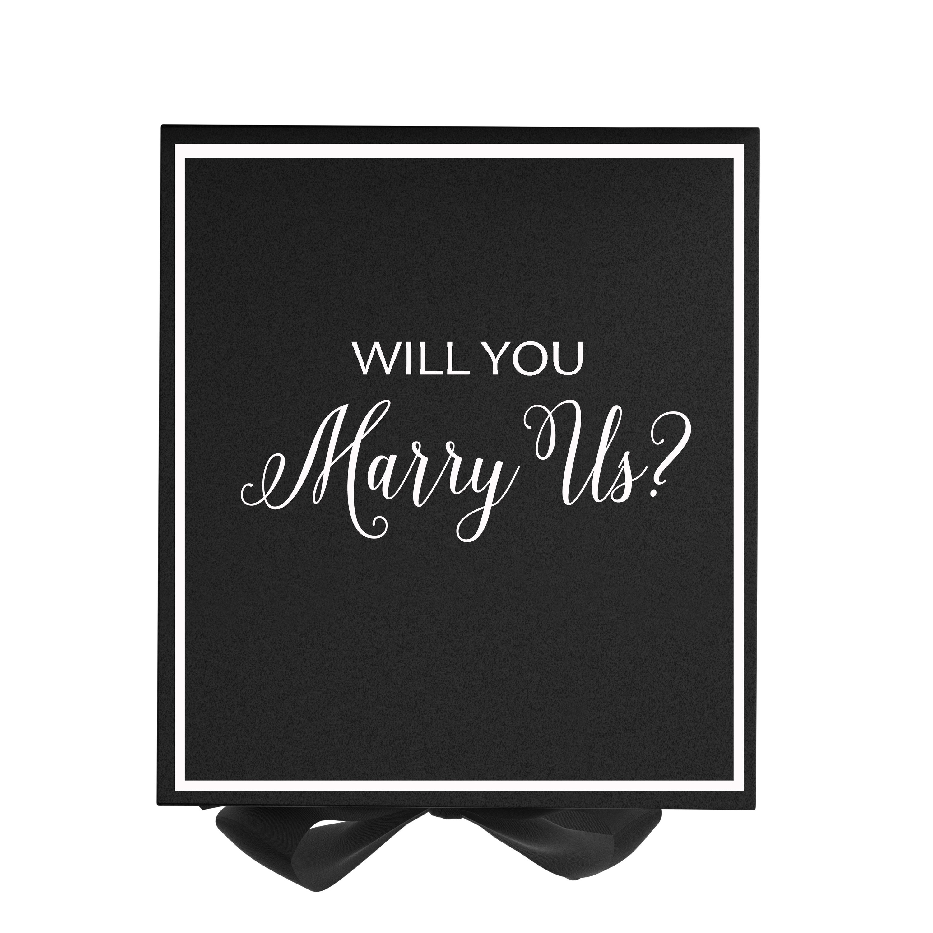 Elegant black proposal box with metallic writing and a black bow, perfect for engagement proposals.
