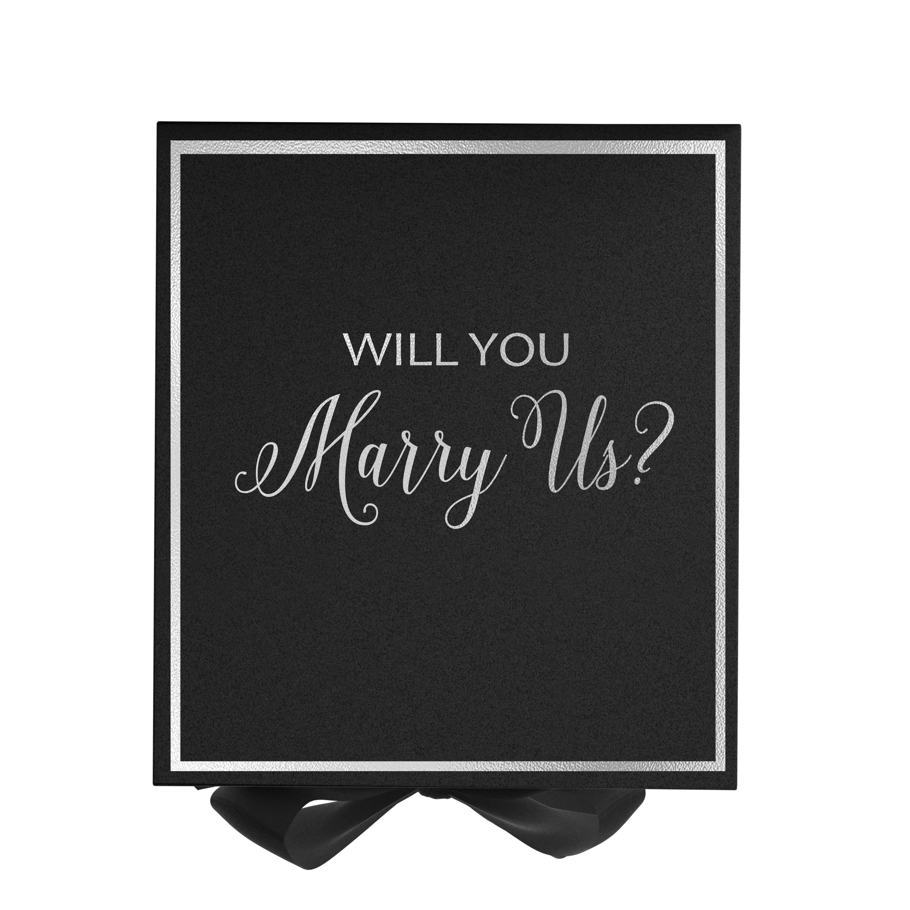 Elegant black proposal box with metallic writing and a black bow, perfect for engagement proposals.