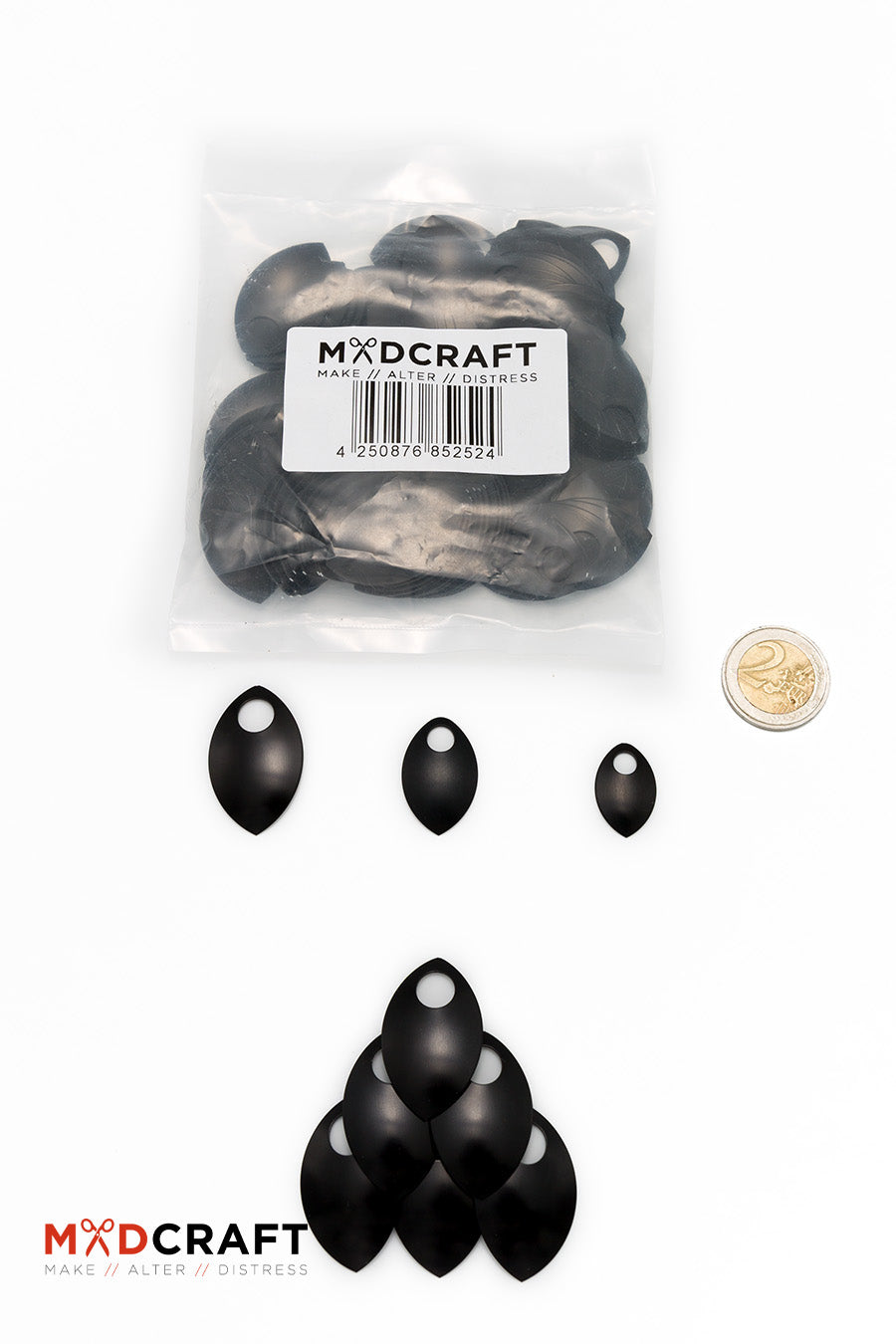 A collection of black aluminum scales, lightweight and perfect for armor customization, displayed in a neat arrangement.