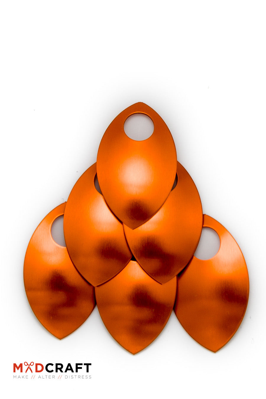 A collection of vibrant orange aluminum scales, perfect for armor customization and crafting unique accessories, showcasing their lightweight and durable design.