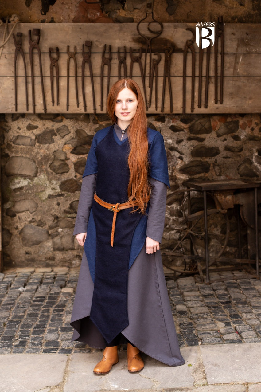 Asua Dark Blue Apron featuring a long, elegant design suitable for various outfits.