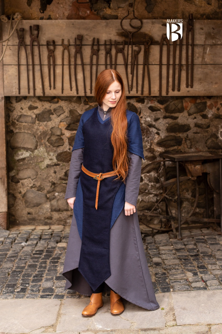 Asua Dark Blue Apron featuring a long, elegant design suitable for various outfits.