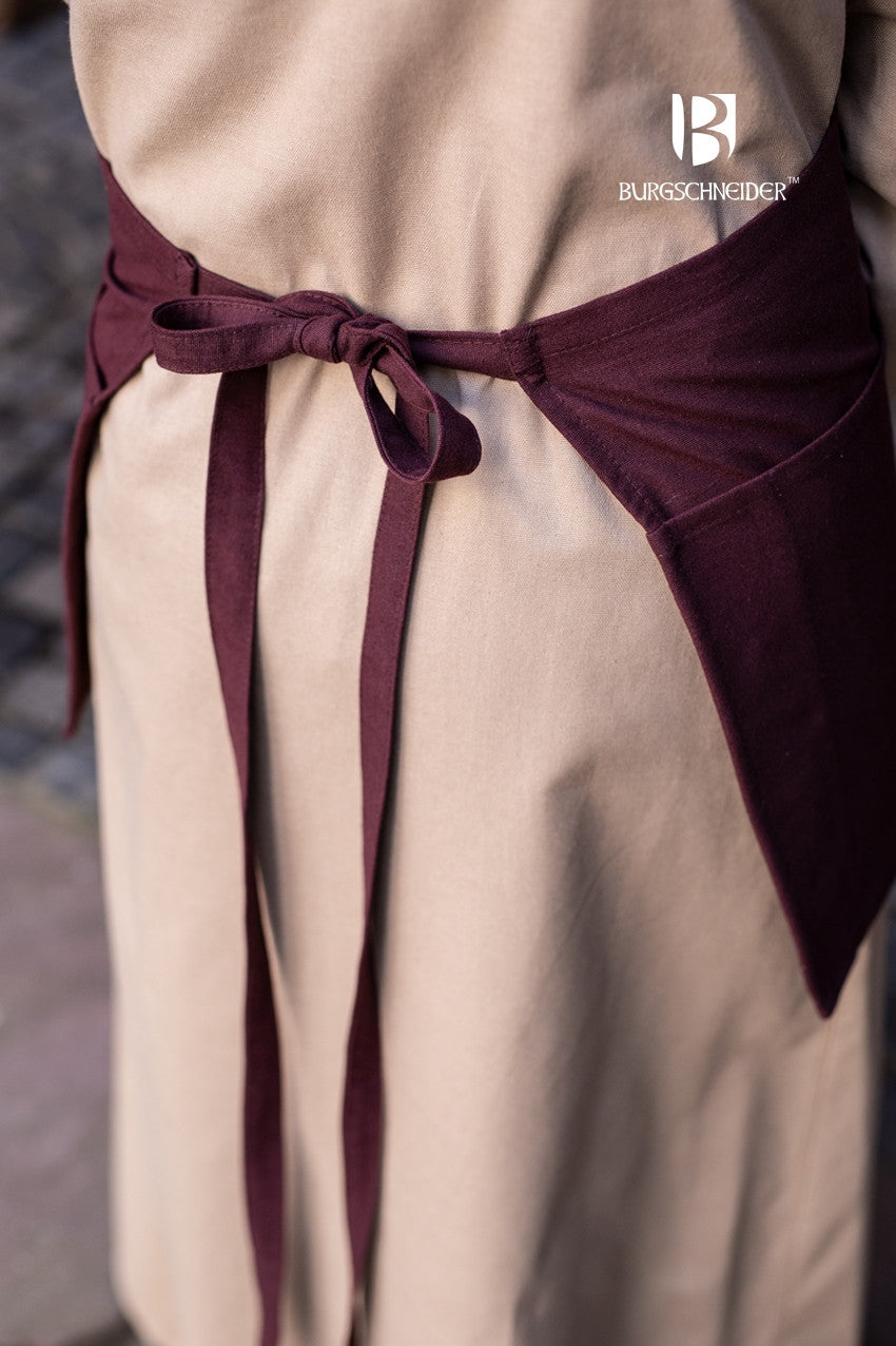Nele Brown Apron made of 100% cotton with a front pouch and long ribbon lacing, ideal for kitchen use and historical reenactments.