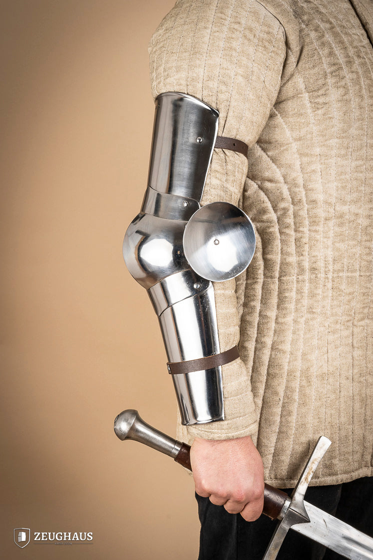 14th century polished arm armor made of 1.6mm steel, featuring intricate engravings and a robust design for historical reenactments.