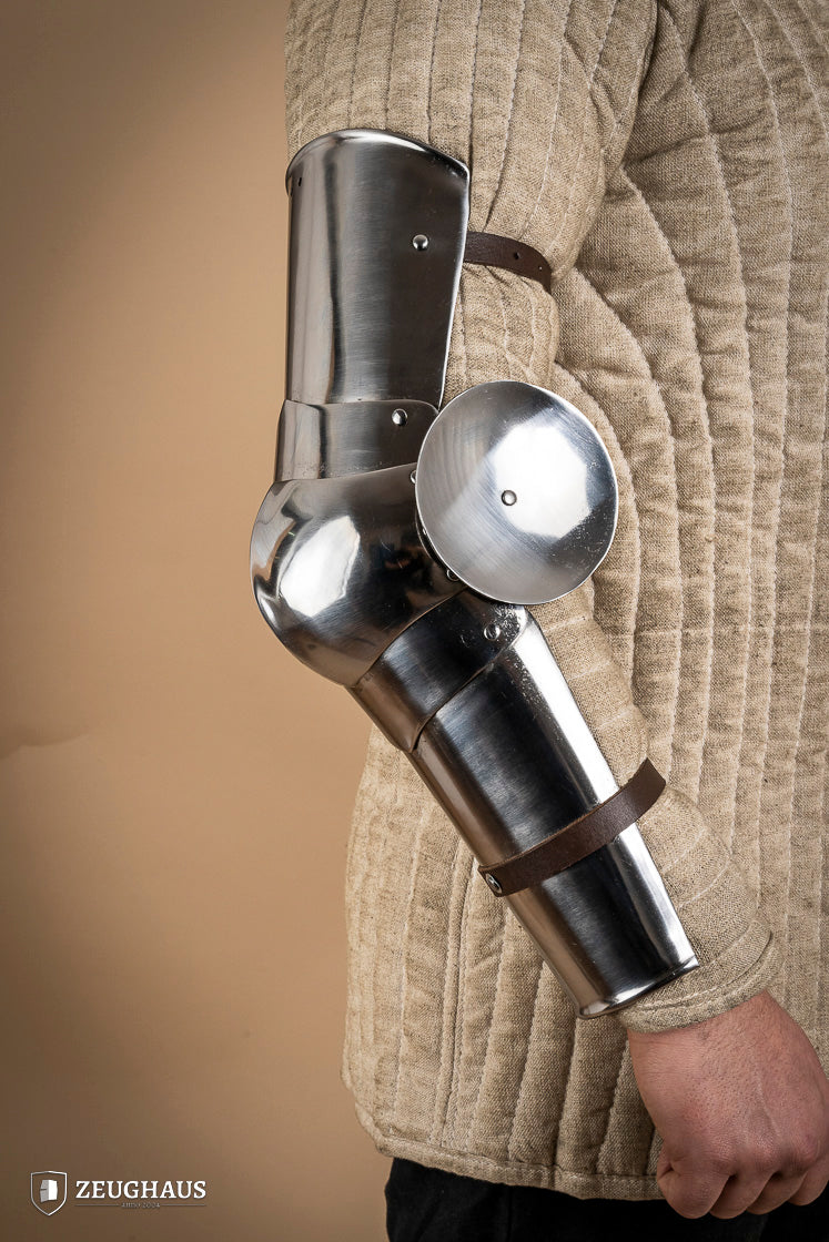 14th century polished arm armor made of 1.6mm steel, featuring intricate engravings and a robust design for historical reenactments.