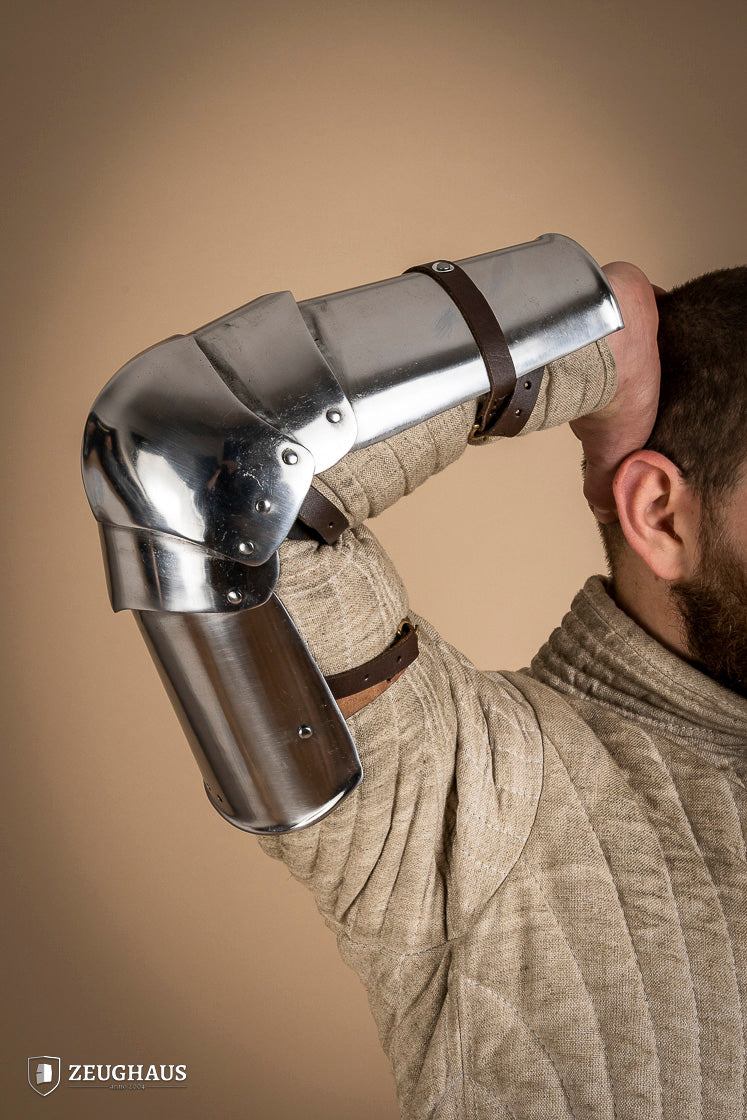 14th century polished arm armor made of 1.6mm steel, featuring intricate engravings and a robust design for historical reenactments.