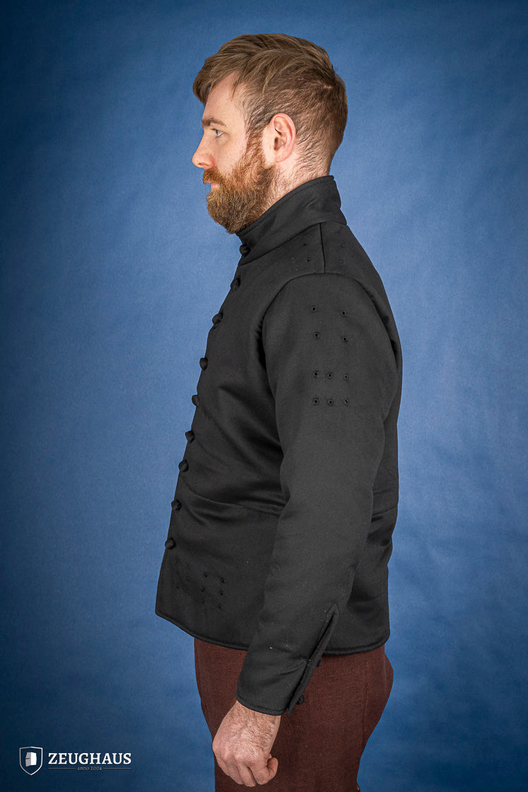 A black 15th-century style arming doublet made of cotton, featuring reinforced armholes and polyester-wool padding, ideal for historical reenactments.