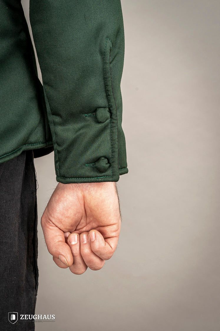 15th-century-style Arming Doublet in vibrant green, made from lightweight cotton with padding, designed for comfort under armor.