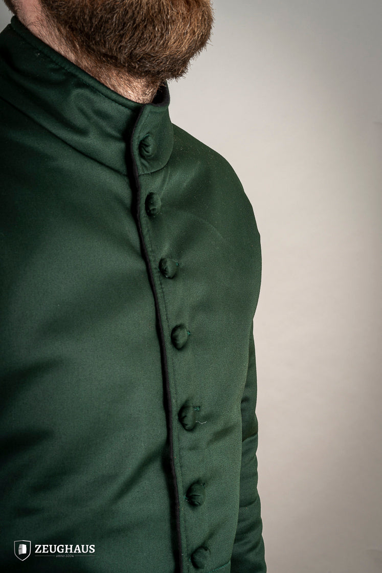 15th-century-style Arming Doublet in vibrant green, made from lightweight cotton with padding, designed for comfort under armor.