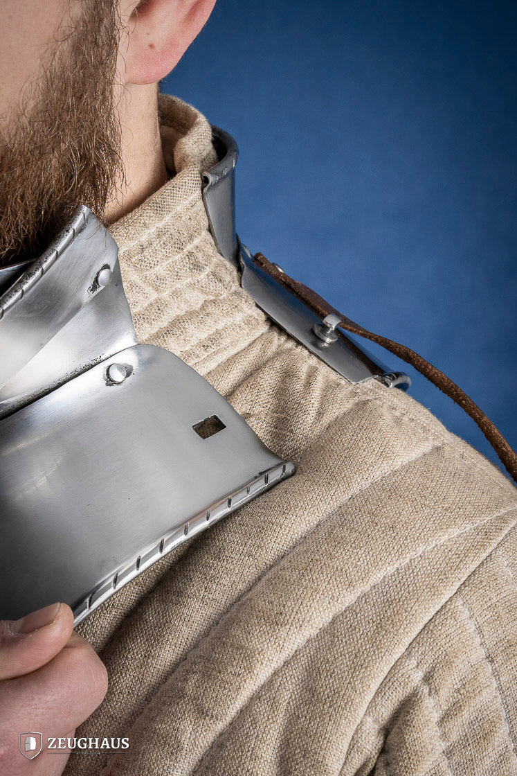 Articulated Gorget with Bevor, 15th-century armor piece made of 2mm polished steel, showcasing intricate design and secure fit.