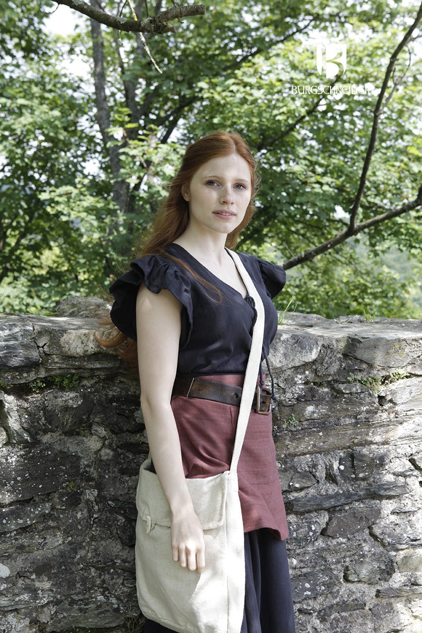 The Bag Ehwaz Hemp, a medieval-style bag made of unkempt cotton, featuring a long strap and coarse fabric for authenticity.