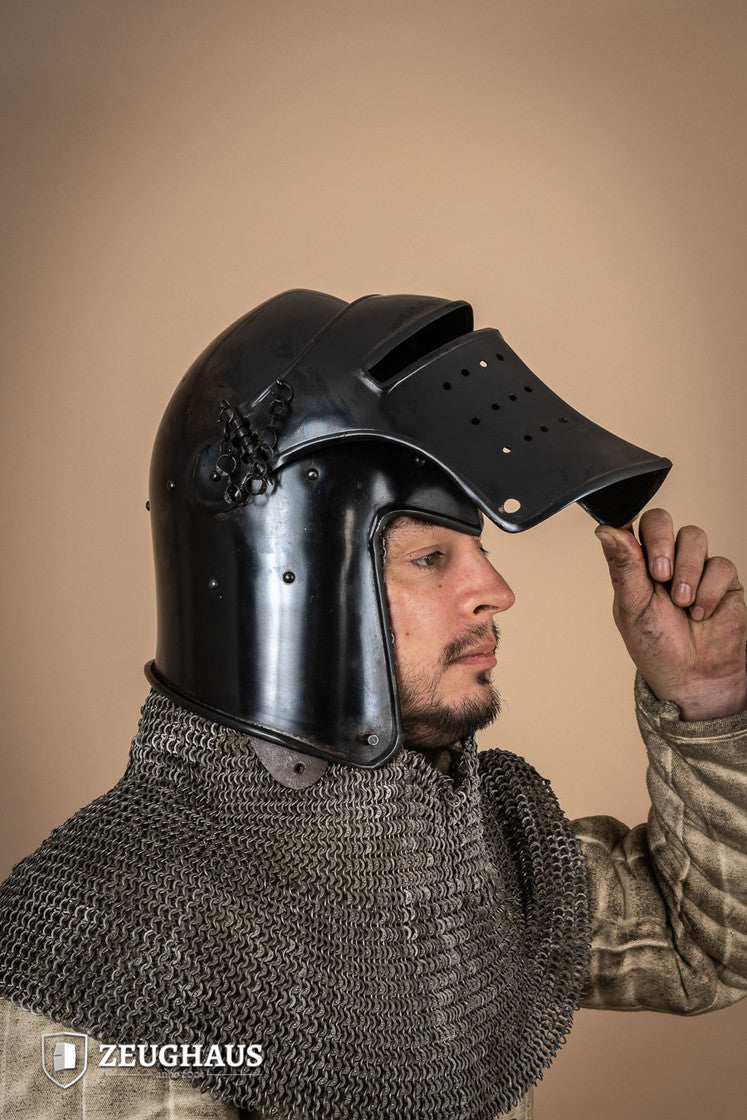 Bascinet Avenger 1.6mm Burnished helmet with detachable visor, showcasing its medieval design and craftsmanship.