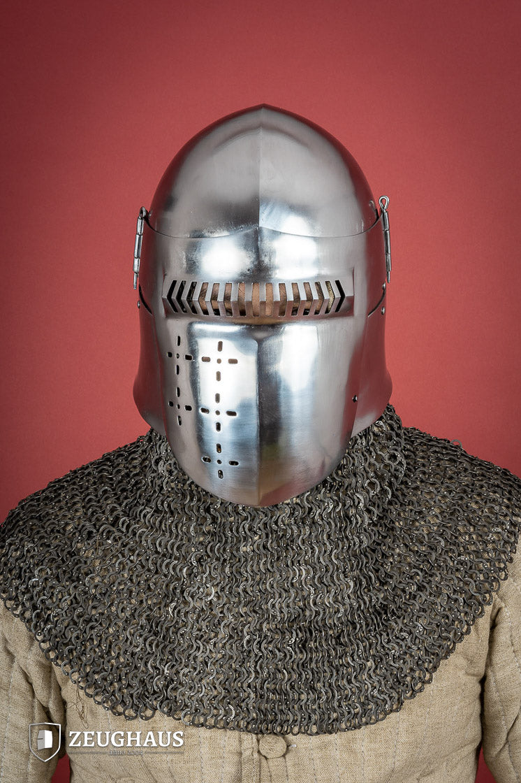14th-century Bascinet Helmet made of 2mm polished steel with a pyramidal grille visor and leather chin strap.