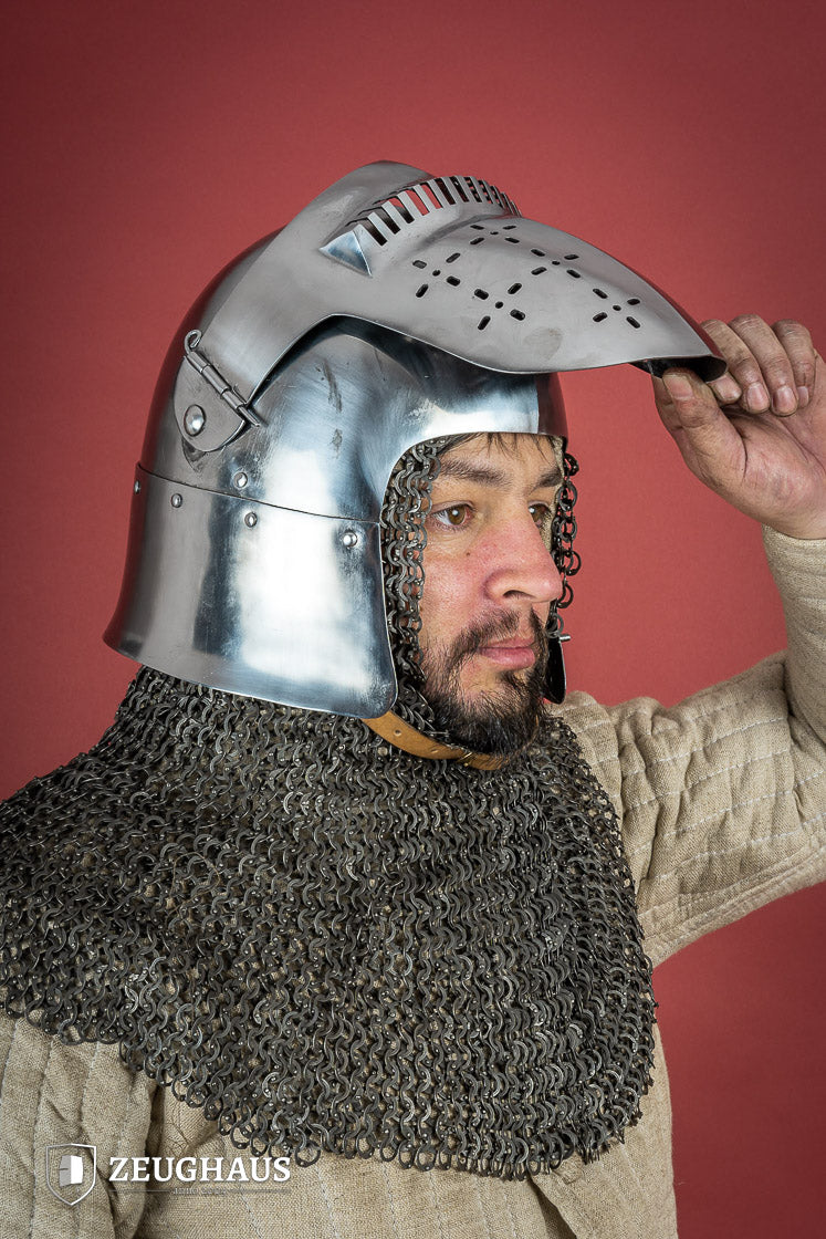 14th-century Bascinet Helmet made of 2mm polished steel with a pyramidal grille visor and leather chin strap.