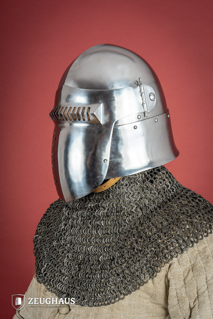 14th-century Bascinet Helmet made of 2mm polished steel with a pyramidal grille visor and leather chin strap.