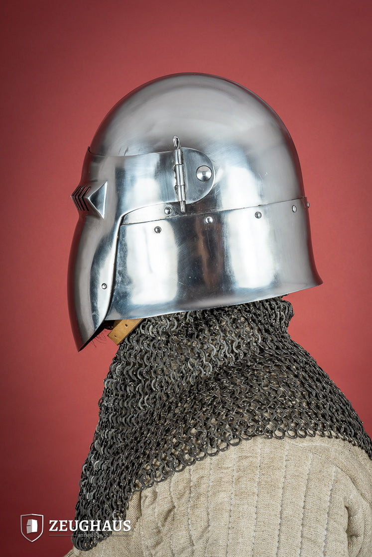 14th-century Bascinet Helmet made of 2mm polished steel with a pyramidal grille visor and leather chin strap.