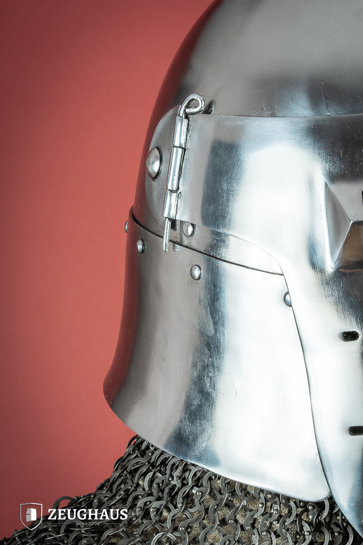 14th-century Bascinet Helmet made of 2mm polished steel with a pyramidal grille visor and leather chin strap.