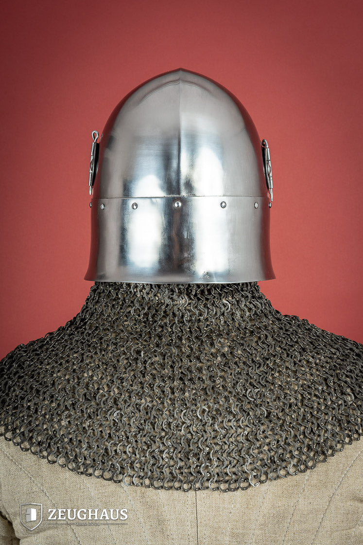 14th-century Bascinet Helmet made of 2mm polished steel with a pyramidal grille visor and leather chin strap.