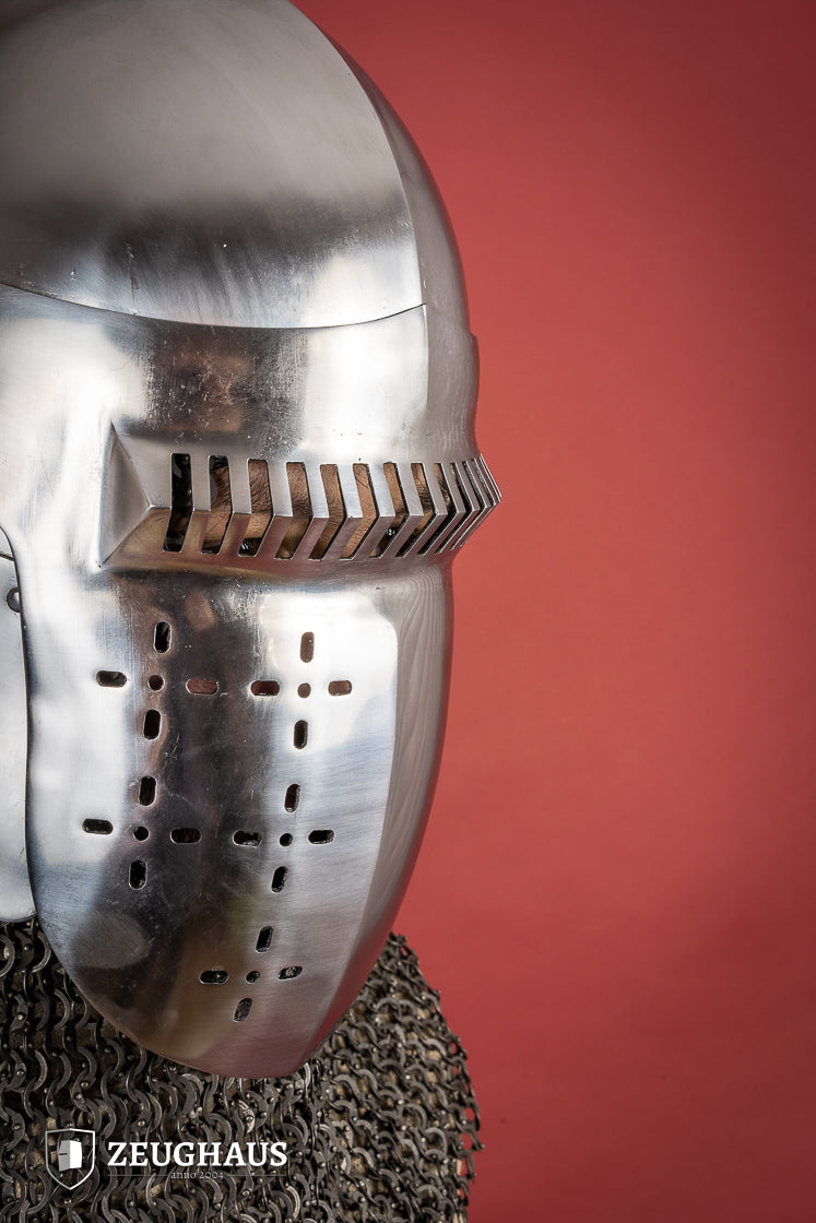 14th-century Bascinet Helmet made of 2mm polished steel with a pyramidal grille visor and leather chin strap.