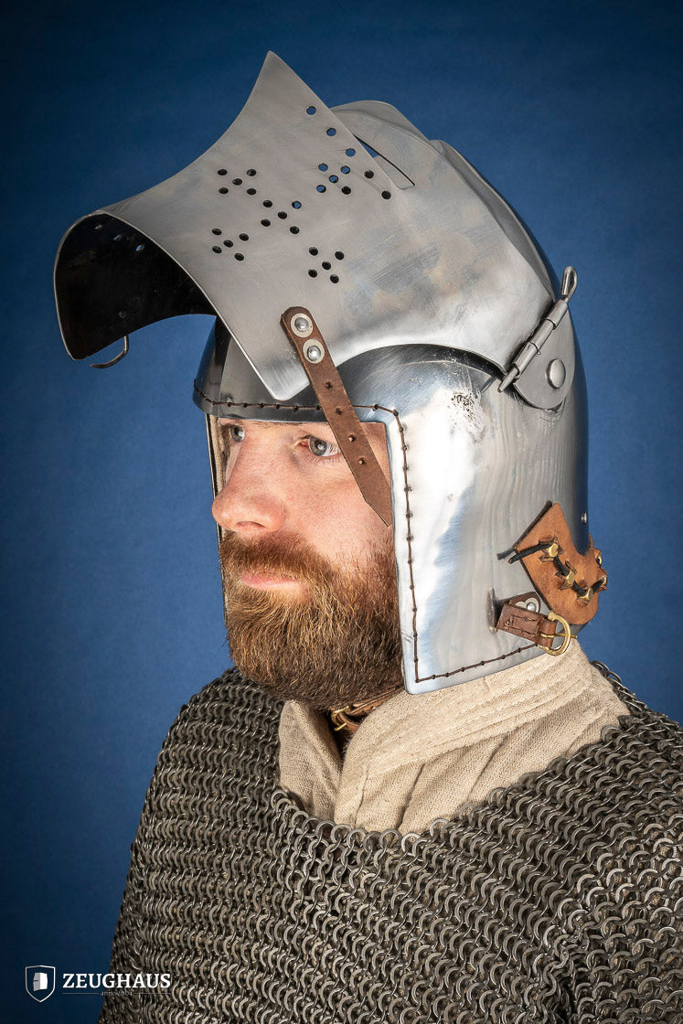 Polished Bascinet Helmet made of 2mm steel with adjustable visor and ventilation holes, featuring a leather chin strap.