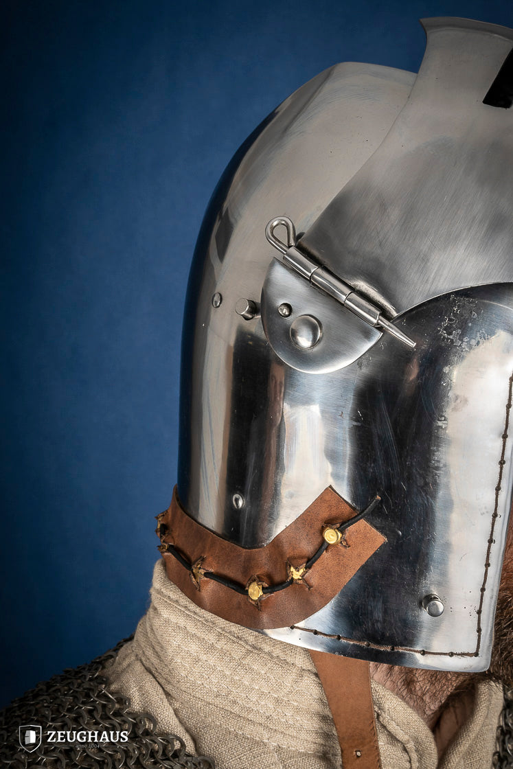 Polished Bascinet Helmet made of 2mm steel with adjustable visor and ventilation holes, featuring a leather chin strap.