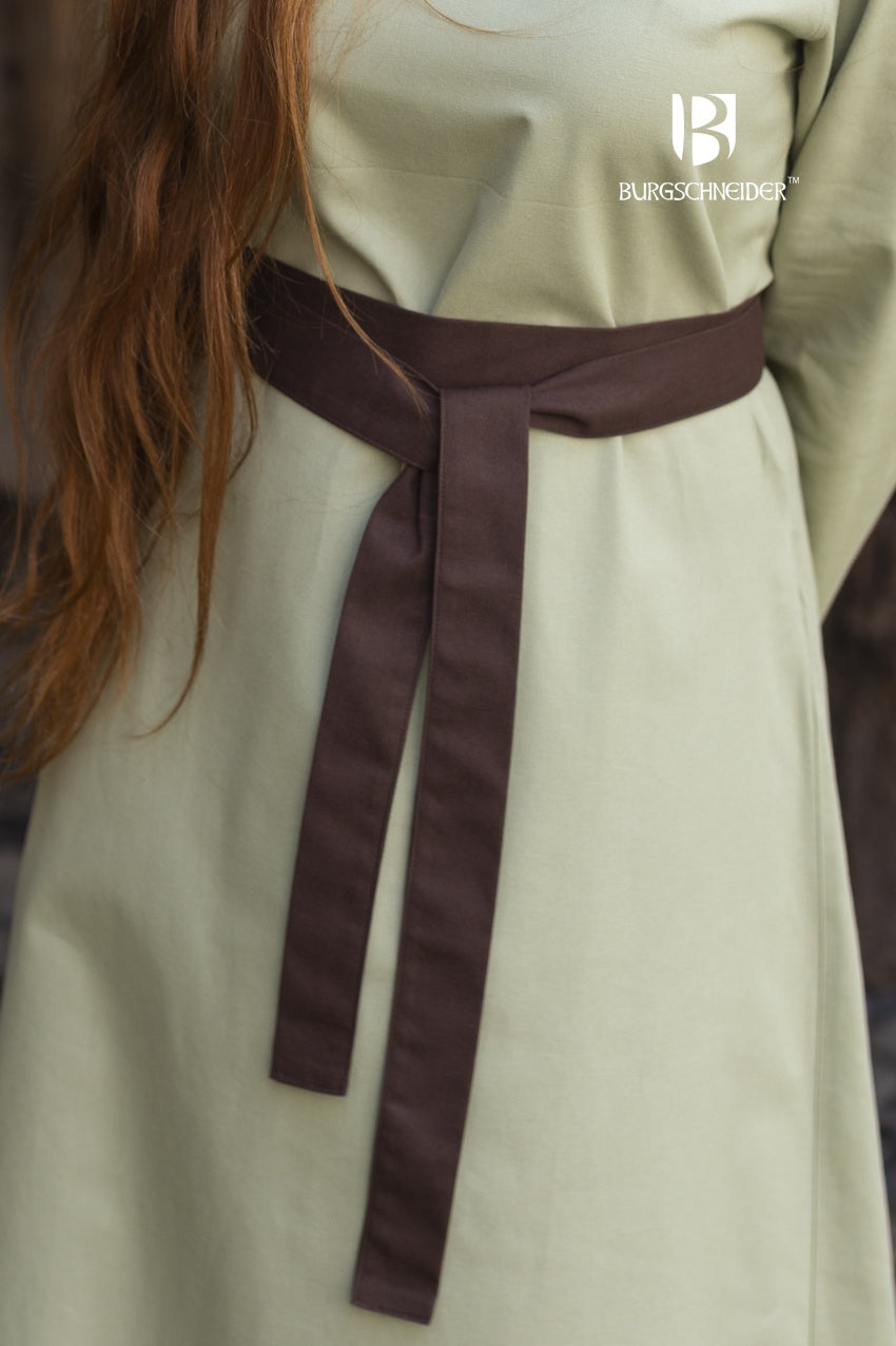 Hedwig Brown Belt made of 100% cotton, elegantly tied at the front, showcasing its rich brown color and simple design.