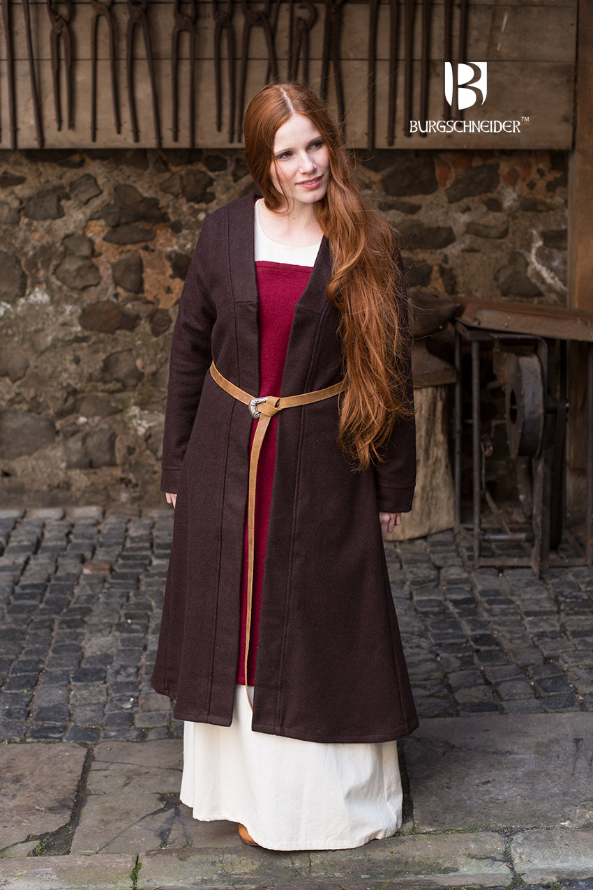 Birka Coat Aslaug in brown, showcasing its long sleeves and calf-length design, inspired by Viking fashion.