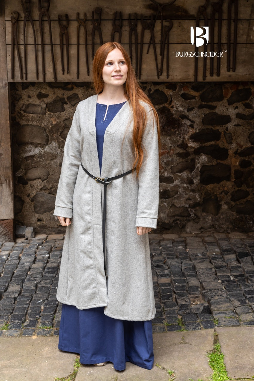 Birka Coat Aslaug in grey, showcasing its long sleeves and calf-length design, inspired by Viking-era fashion.