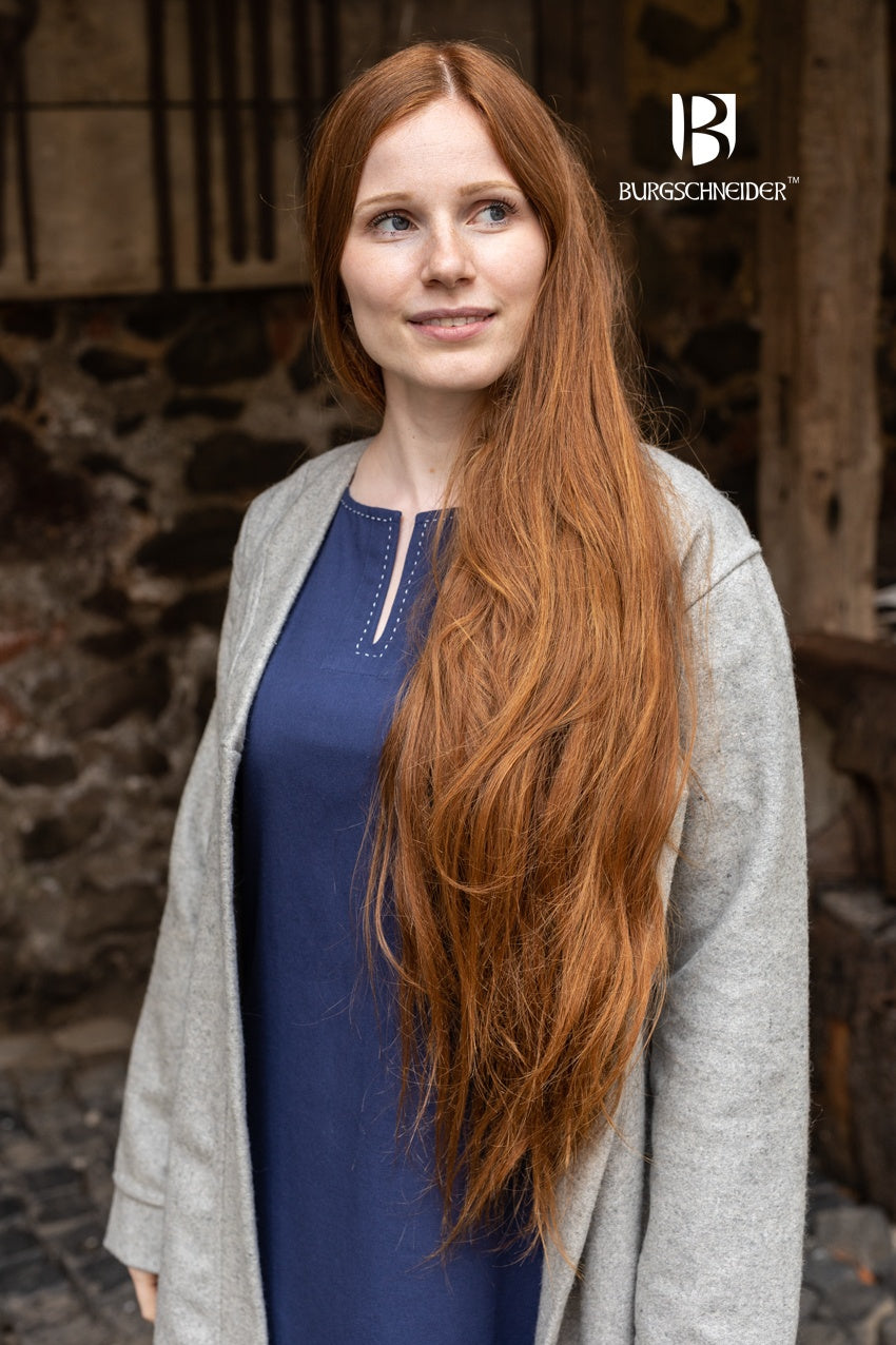 Birka Coat Aslaug in grey, showcasing its long sleeves and calf-length design, inspired by Viking-era fashion.