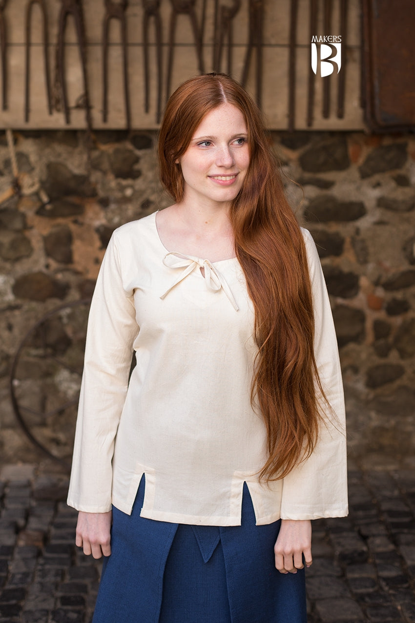 Blouse Lysia Natural featuring flared sleeves and adjustable lacing at the back, made from soft cotton fabric.