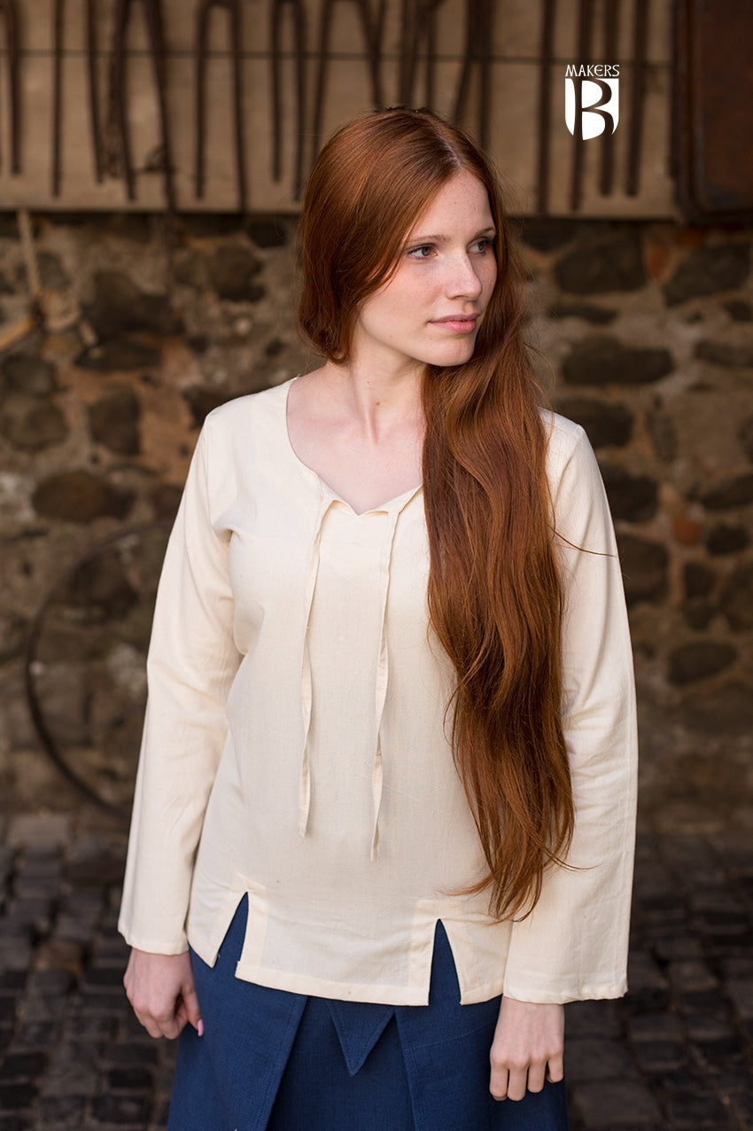 Blouse Lysia Natural featuring flared sleeves and adjustable lacing at the back, made from soft cotton fabric.
