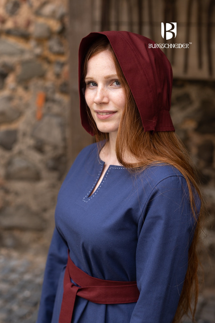 The Bonnet Helga Bordeaux, a 100% cotton medieval hood with a round brim, showcasing its elegant bordeaux color and detailed craftsmanship.