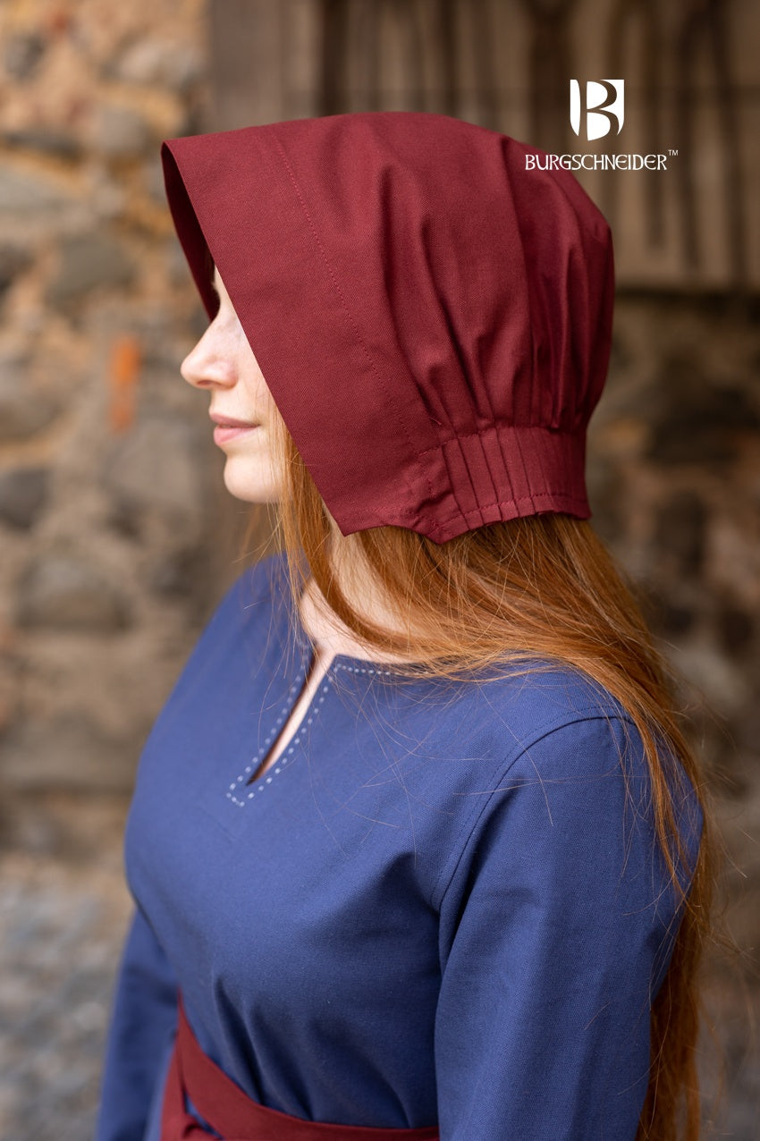 The Bonnet Helga Bordeaux, a 100% cotton medieval hood with a round brim, showcasing its elegant bordeaux color and detailed craftsmanship.