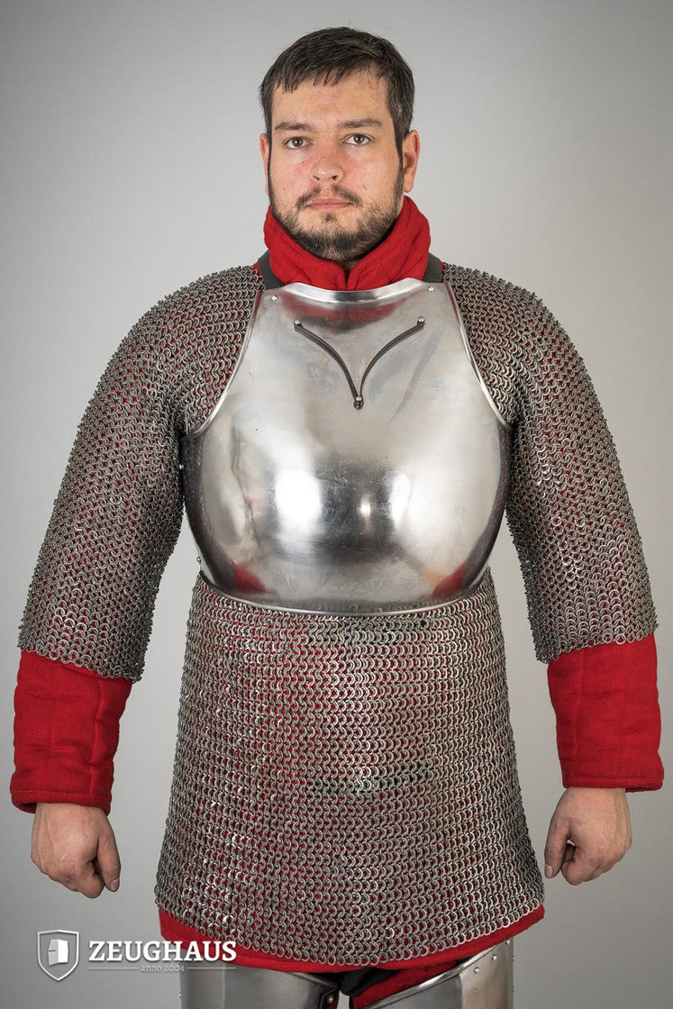Polished 14th Century breastplate made of 1.6mm steel, showcasing its elegant design and protective features.