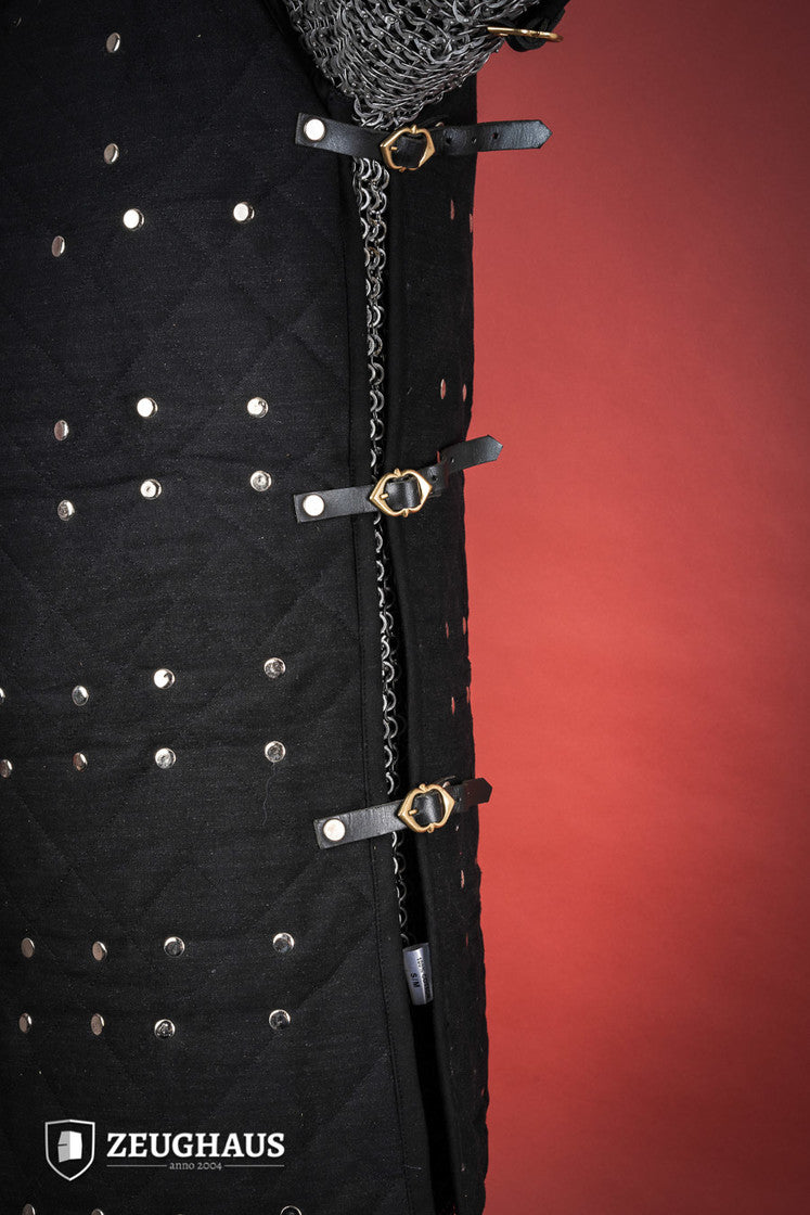 Brigantine Black body armor featuring riveted steel plates and leather straps, designed for comfort and protection in LARP and exhibition combat.