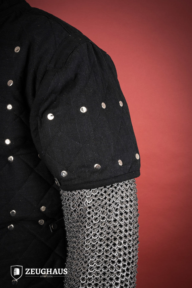 Brigantine Black body armor featuring riveted steel plates and leather straps, designed for comfort and protection in LARP and exhibition combat.