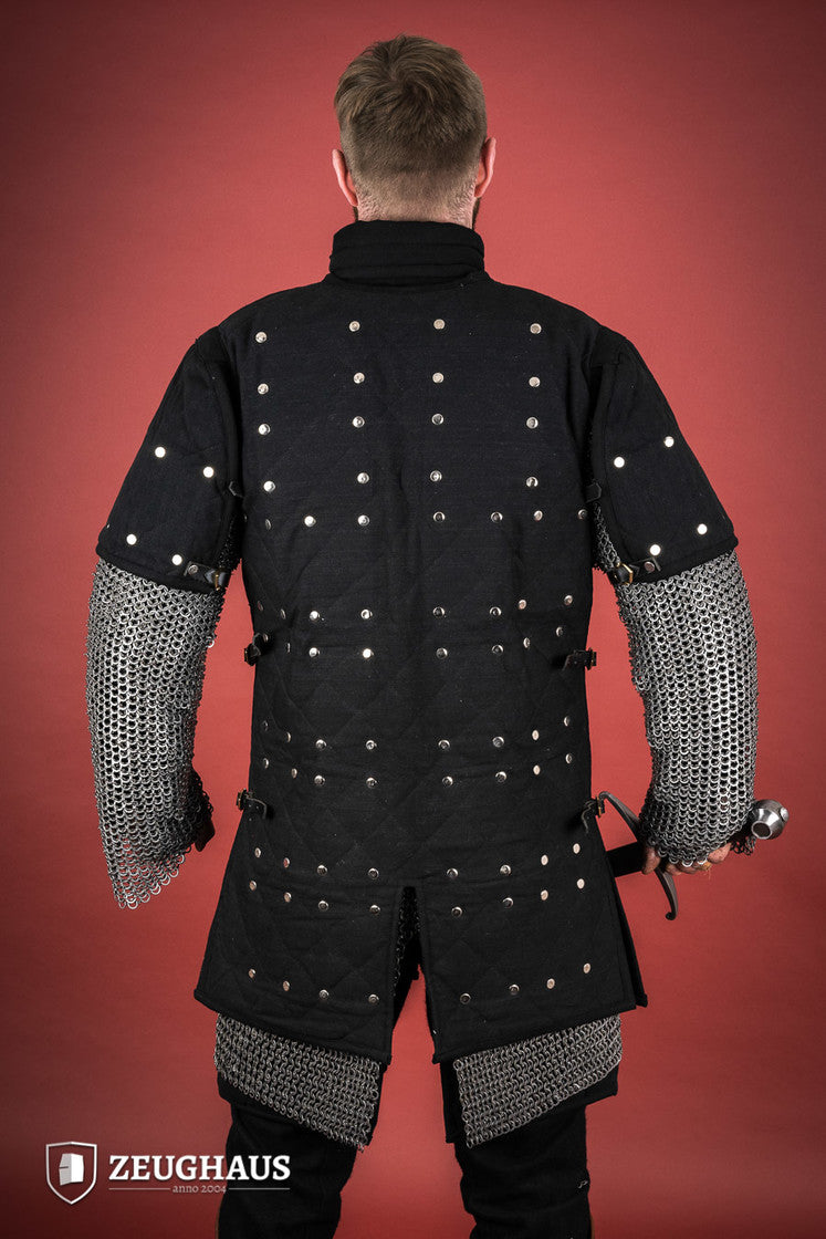 Brigantine Black body armor featuring riveted steel plates and leather straps, designed for comfort and protection in LARP and exhibition combat.