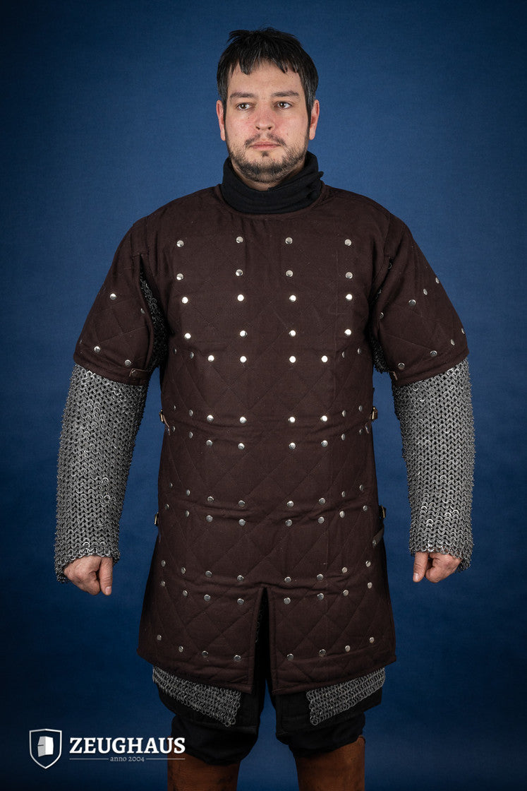 Brown Brigantine armor with studded detailing and leather straps, designed for warriors.